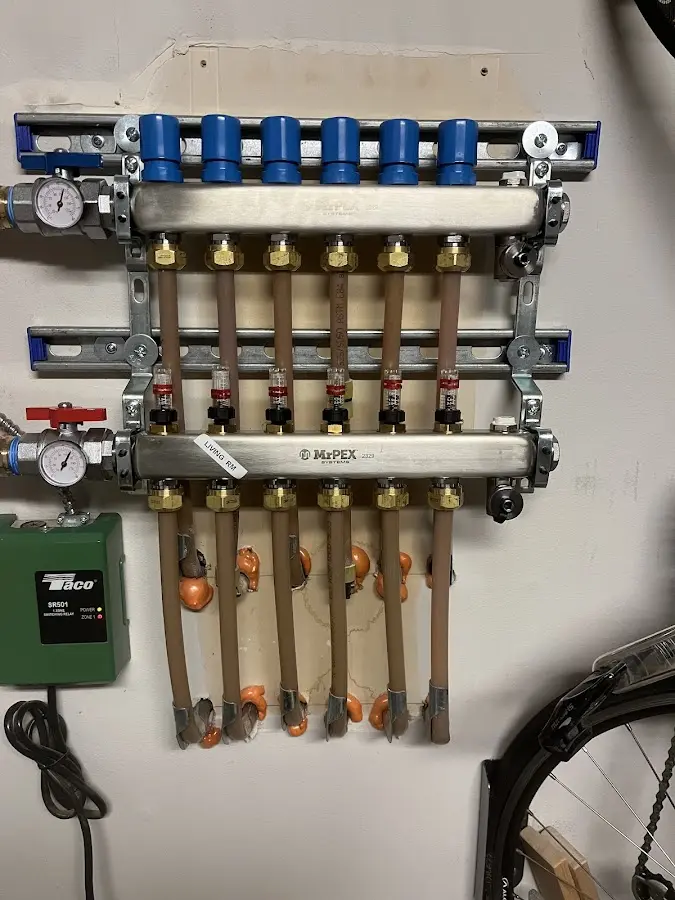 Plumber performing Gas Line Installation at a residential property in Ashland