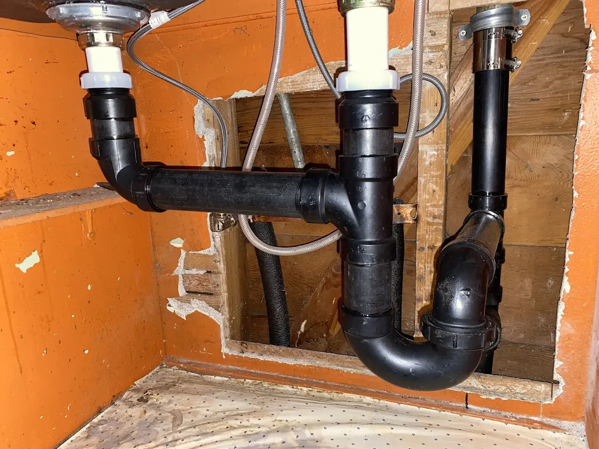 Professional Garbage Disposal Repair equipment and tools on the job in Ashland